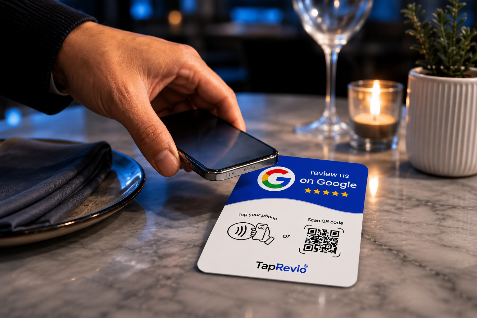 A customer tapping their phone against a TapRevio NFC Google Review Card on a restaurant table